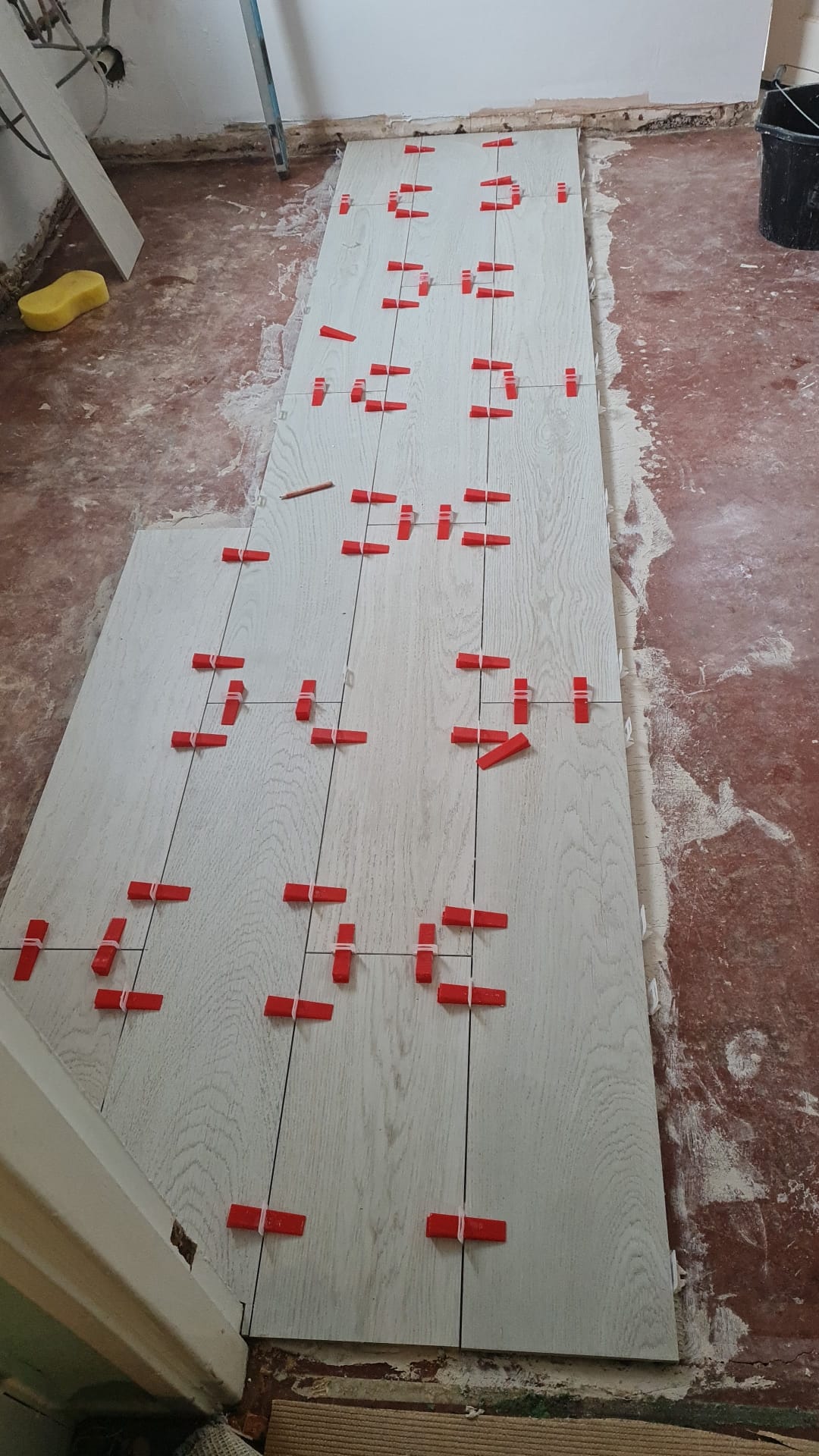 Kitchen stripped back to brick and rebuilt in gloss cashmere — step 8