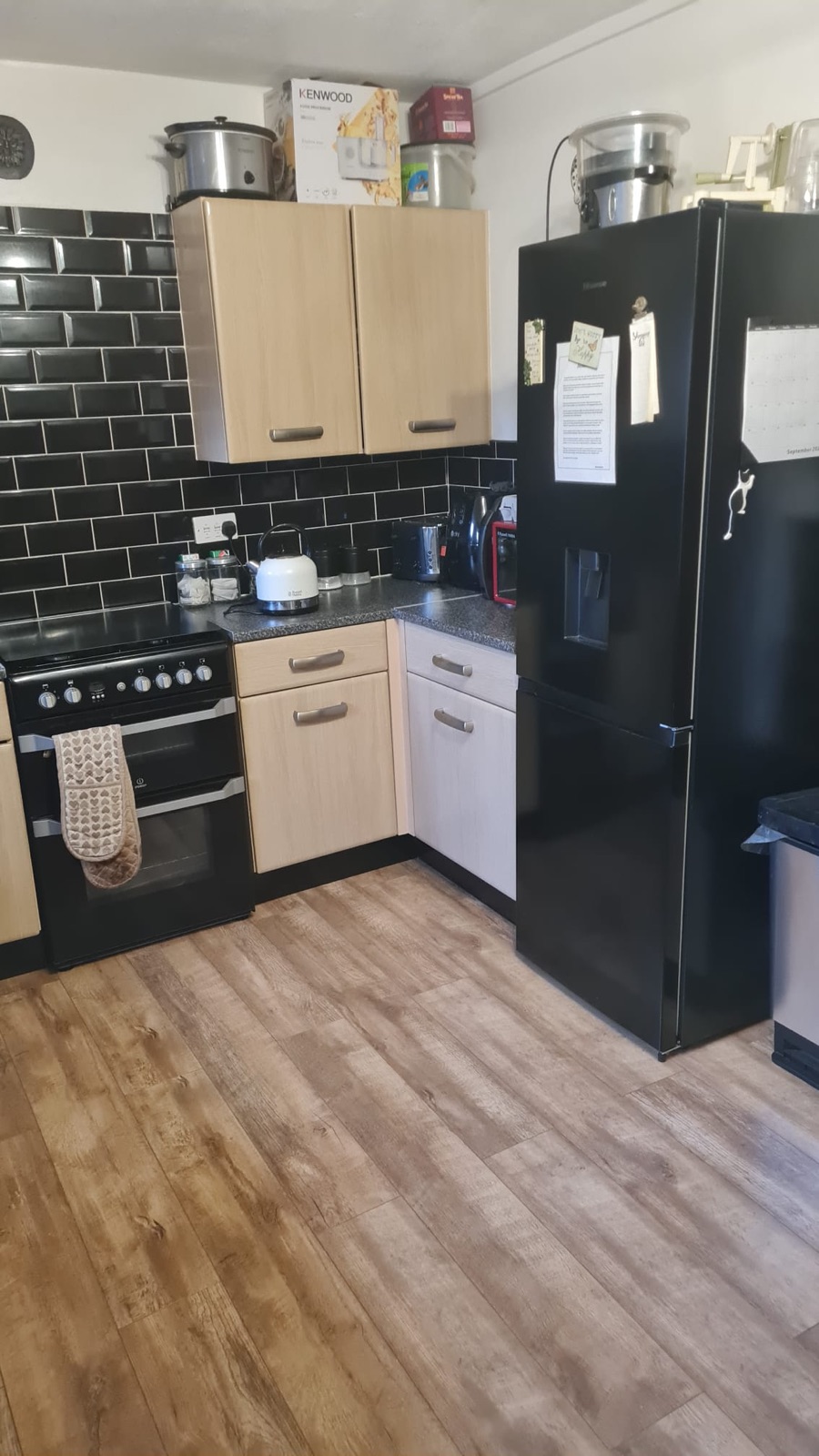 Dark blue shaker kitchen, stripped and rewired — before 1