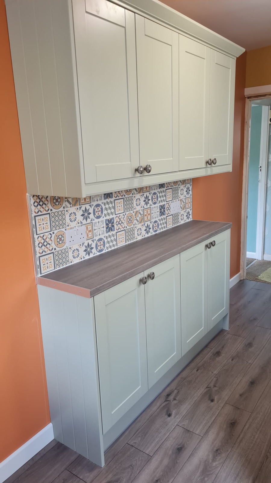 Sage galley kitchen, rebuilt from bare brick