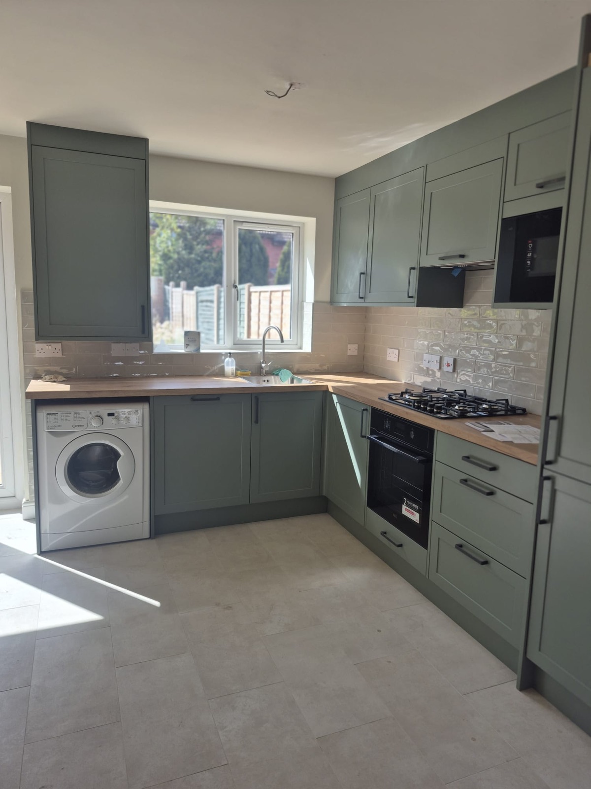 Sage shaker kitchen fitted in Warwickshire