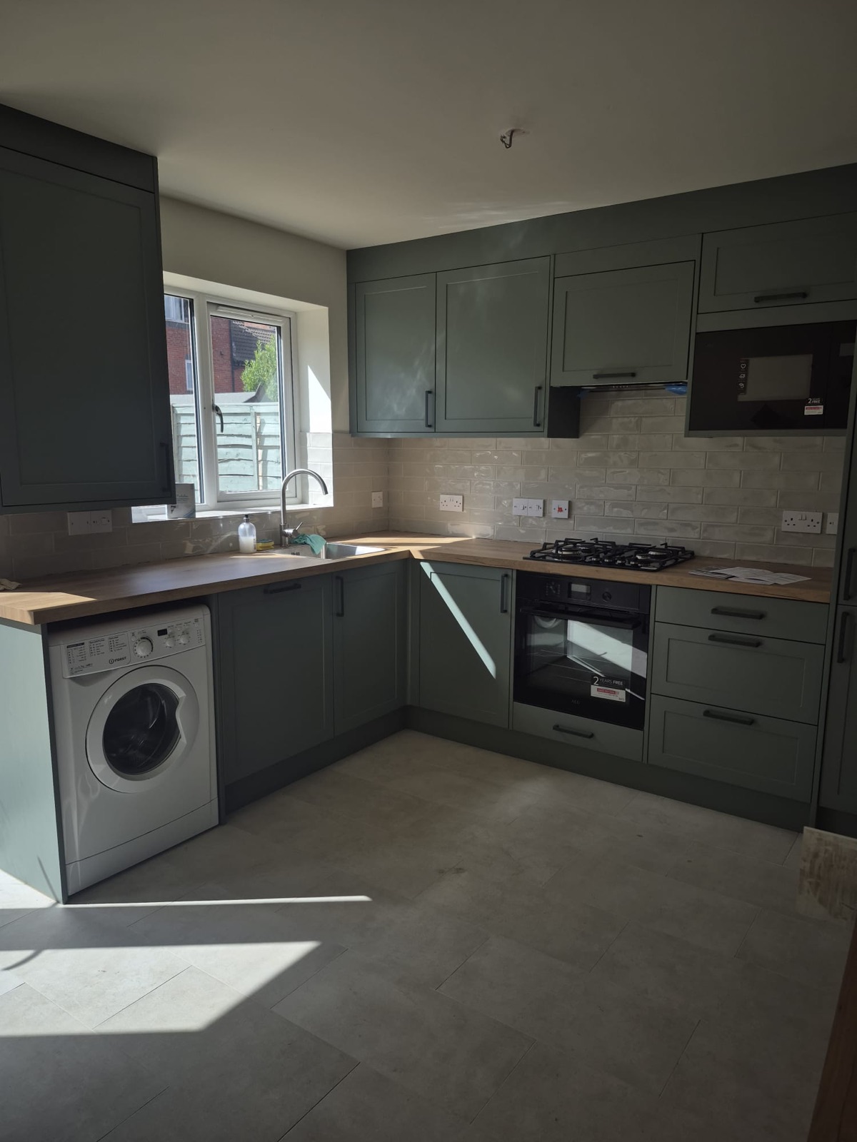 Sage shaker kitchen, fitted from a full strip-out