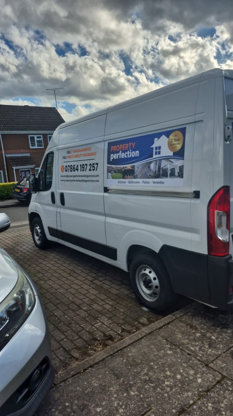 Property Perfection's sign-written van — full 2-year guarantee and public liability insurance on the livery